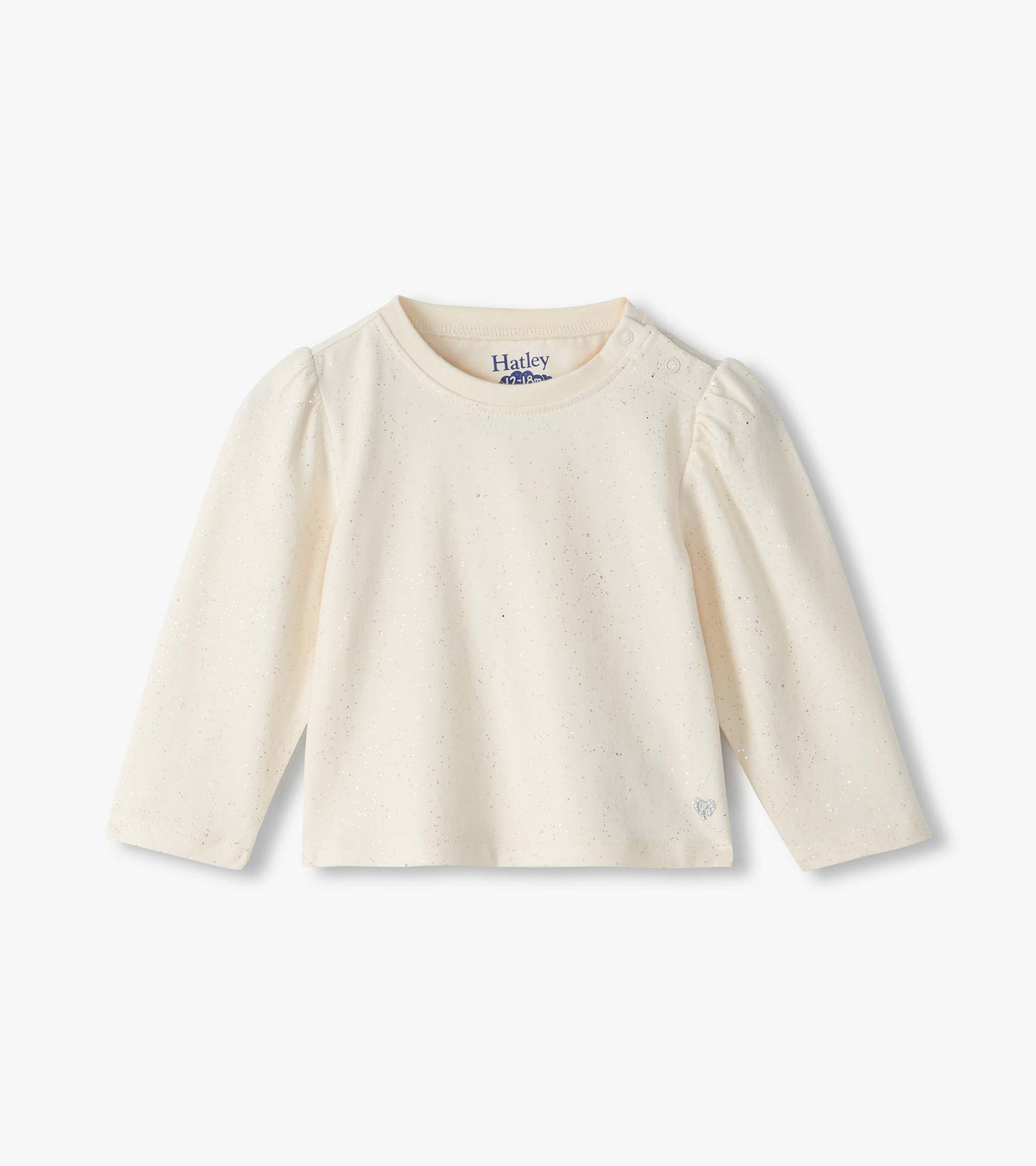 Front view of cream baby tee with silver speckles, puff sleeves, shoulder snaps, and small heart at hem