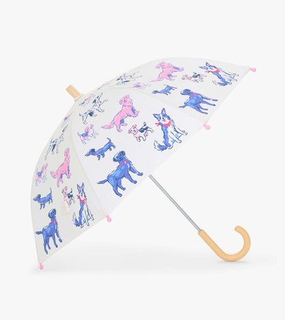 Clear kids umbrella with colorful dog print, pink tip covers, and curved beige handle
