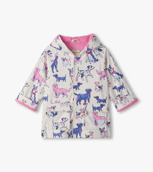 Front view of infant rain coat with blue and pink dog print, pink snap buttons, hood, and front pockets