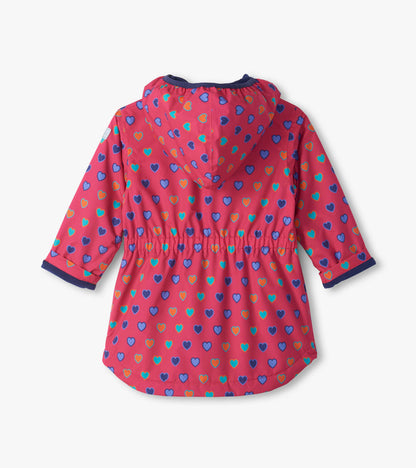Back view of pink Heart Bunches field jacket with hood, elastic waist, and multicolor heart print