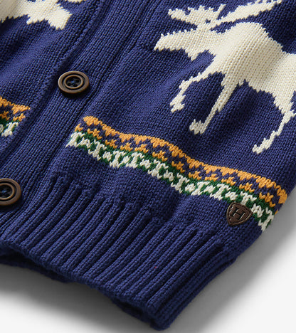 Close-up of blue knit cardigan with moose motif, striped trim, ribbed hem, and brown buttons