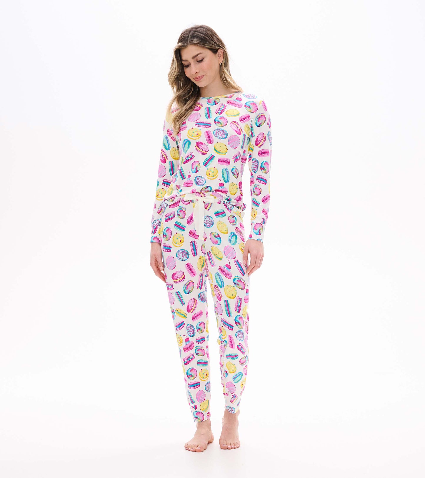 Women's pajama set with colorful macaron and dessert print, front view with long sleeves and drawstring waist