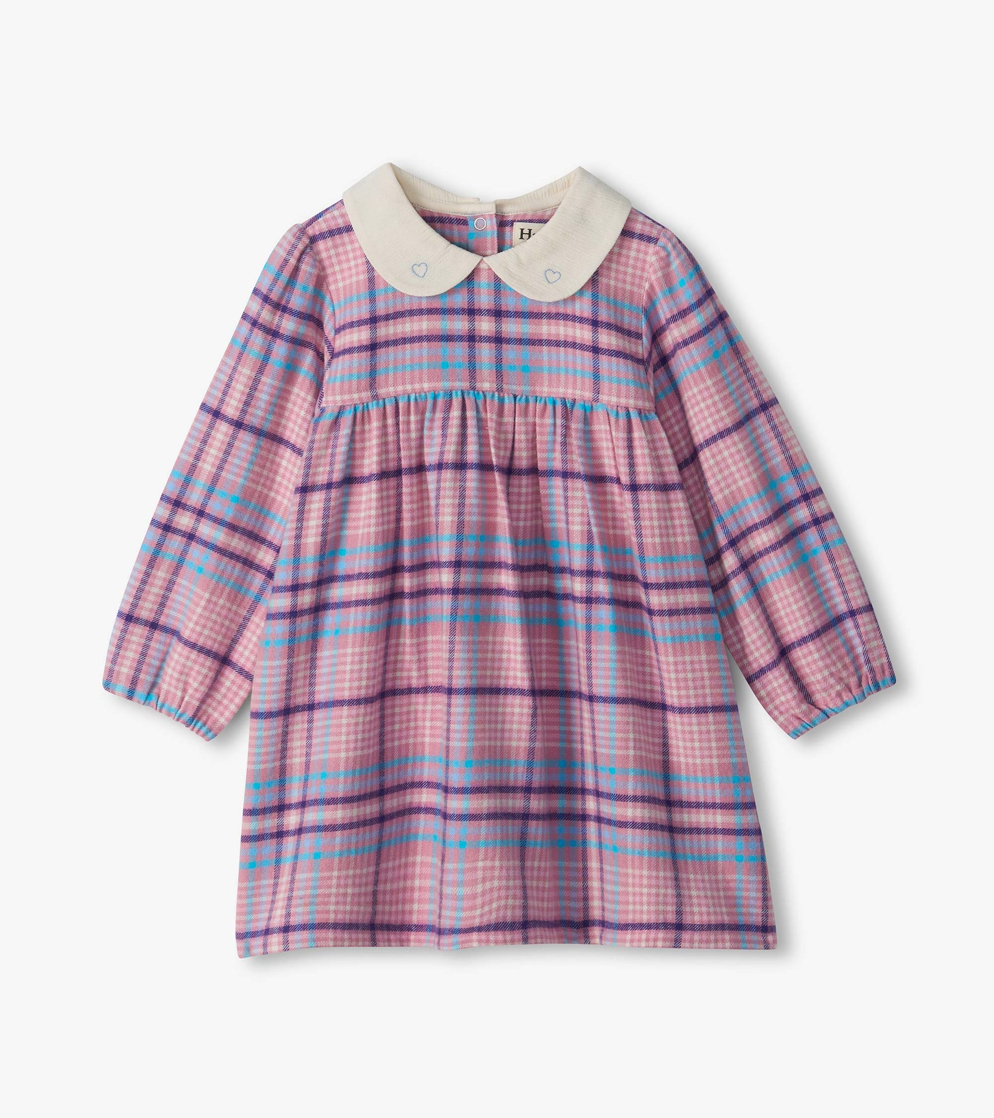 Infant mauve plaid pinafore dress with long puff sleeves and cream Peter Pan collar with small heart embroidery
