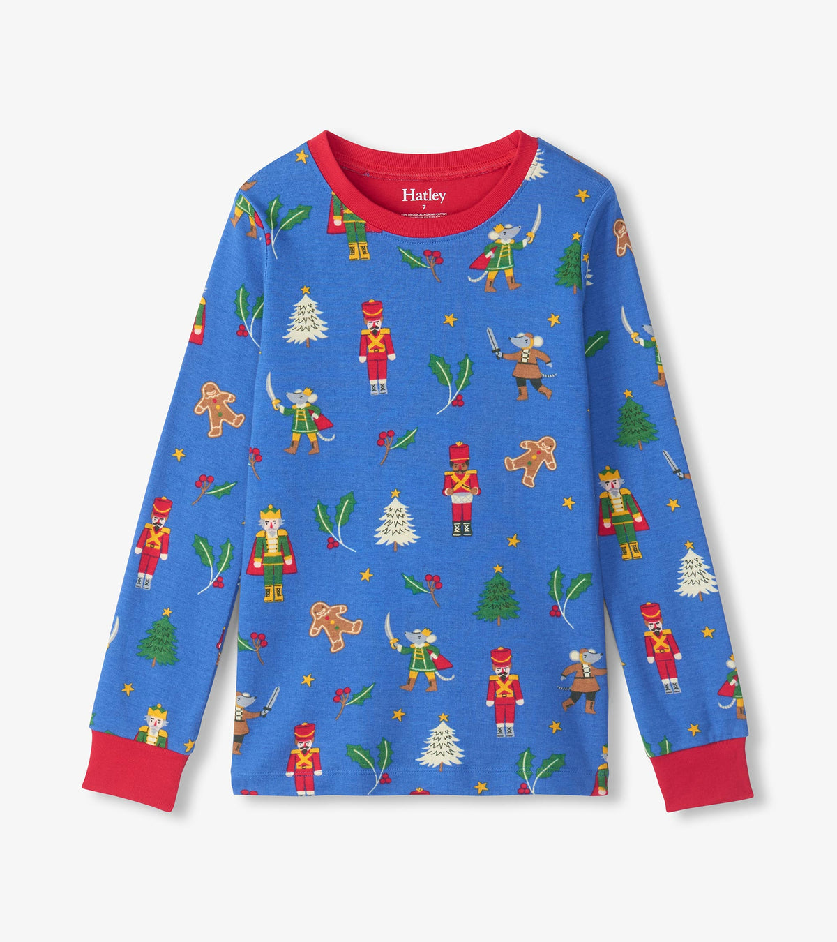 Blue long sleeve pajama top with red neck and cuffs, featuring nutcracker, mouse, tree and holly print