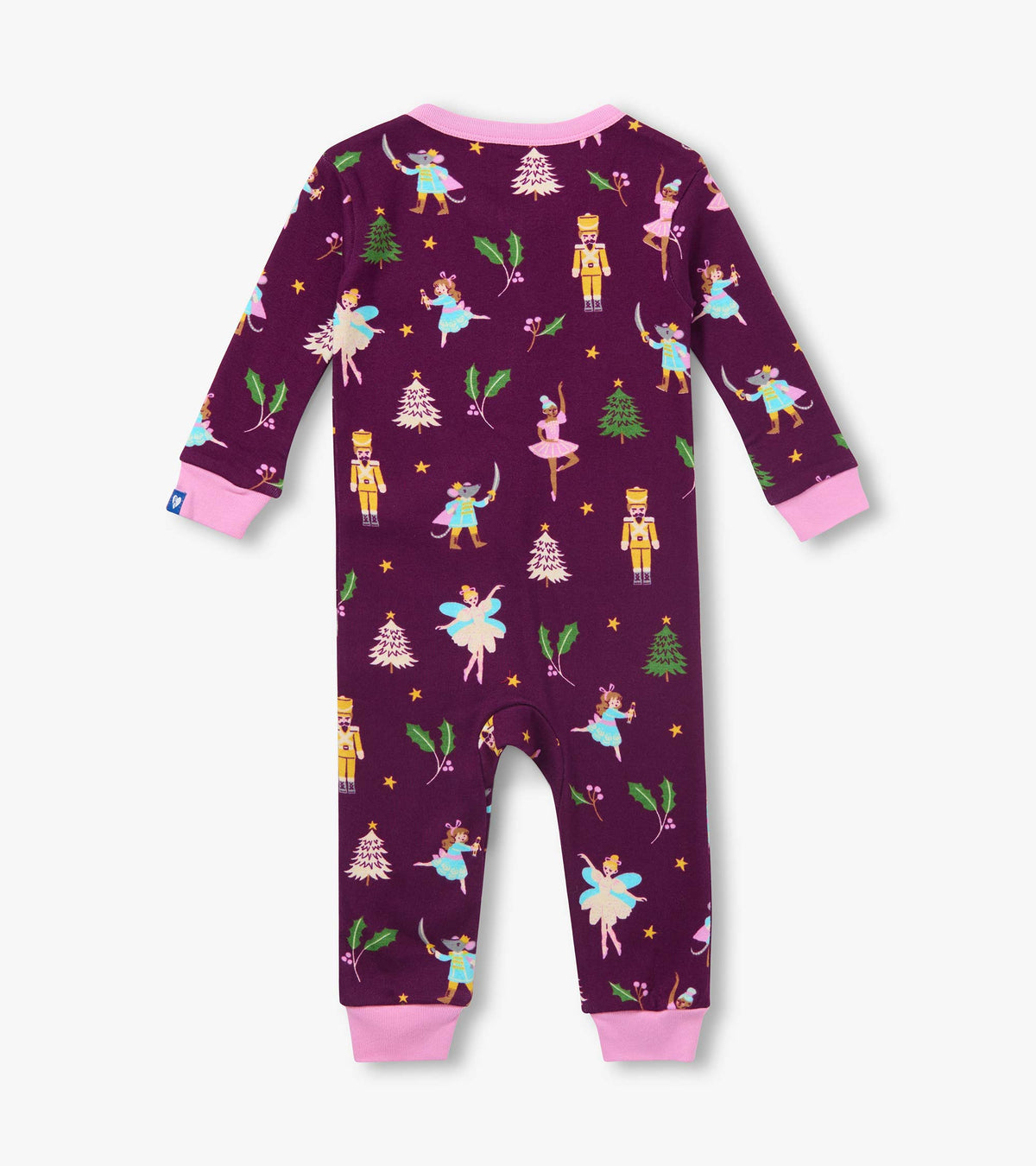 Back view of infant coverall in dark purple with pink cuffs and holiday ballet print with nutcrackers and trees