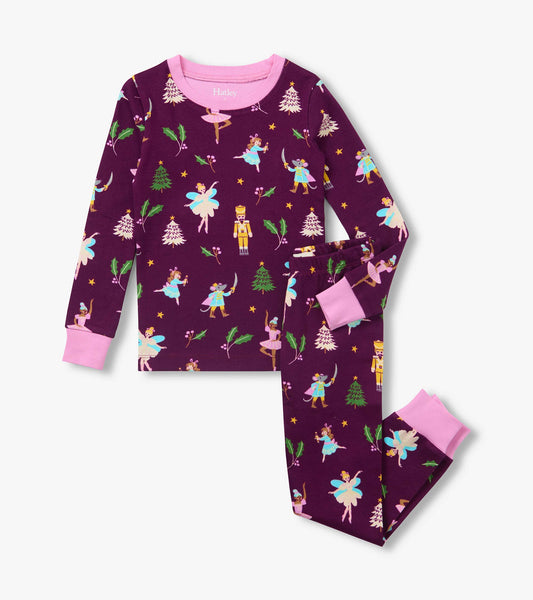 Girls two-piece purple pajama set with pink trim and Nutcracker print of ballerinas, soldiers, holly and trees