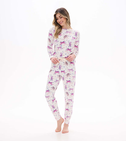 Women's tiger print pajama set with long sleeve top and drawstring pants, angled front view