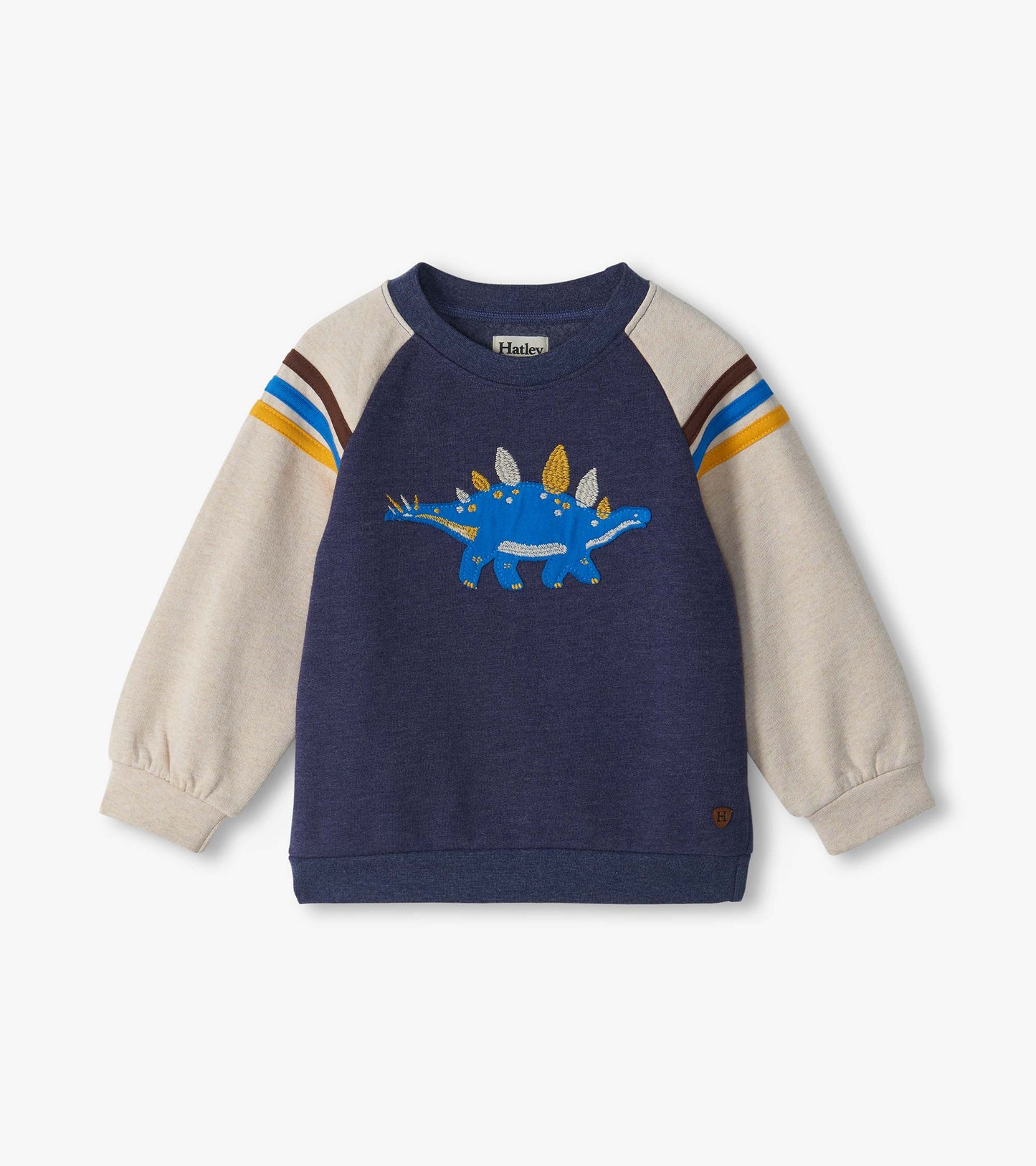 Kids pullover sweatshirt with blue body, cream sleeves, striped shoulders, and blue stegosaurus graphic