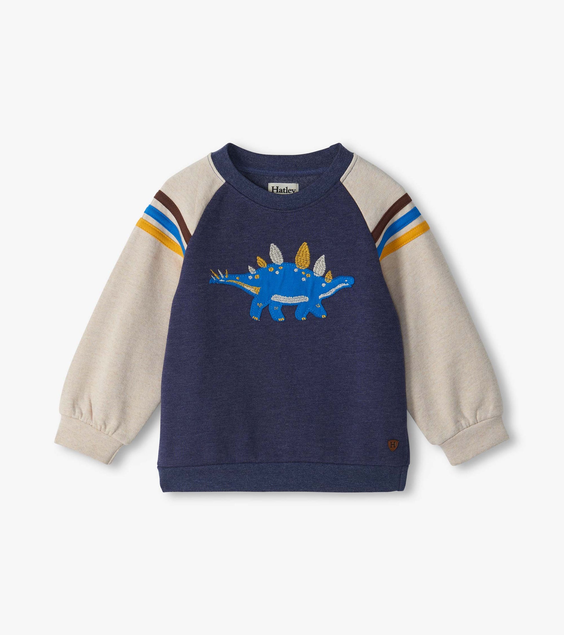 Kids pullover sweatshirt with blue body, cream sleeves, striped shoulders, and blue stegosaurus graphic