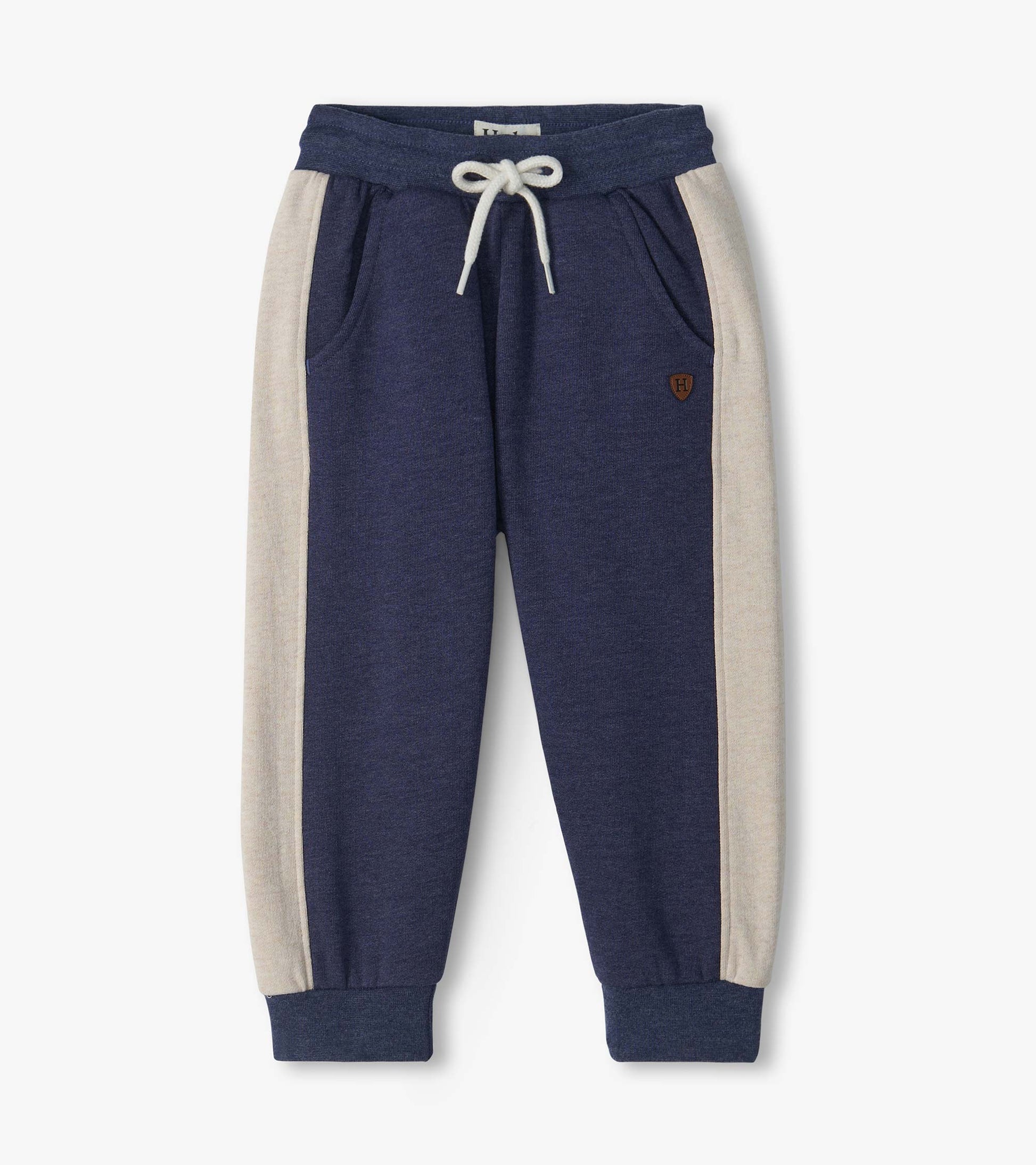 Blue melange infant track pants with cream side panels, drawstring waist, front pockets, and cuffed ankles