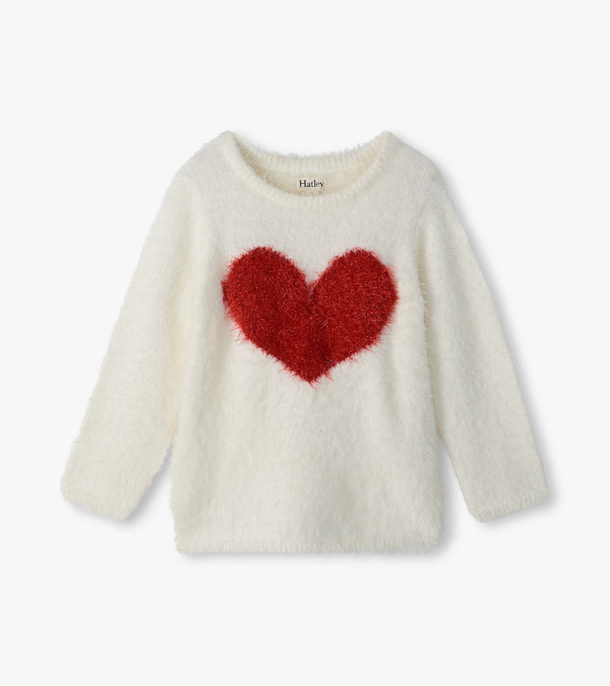 Front view of girls cream fuzzy sweater with long sleeves and a large red heart on the chest