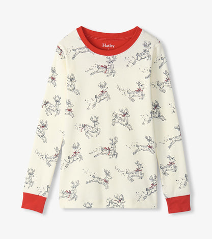 Girls cream pajama top with leaping reindeer print, red crew neckline and red sleeve cuffs