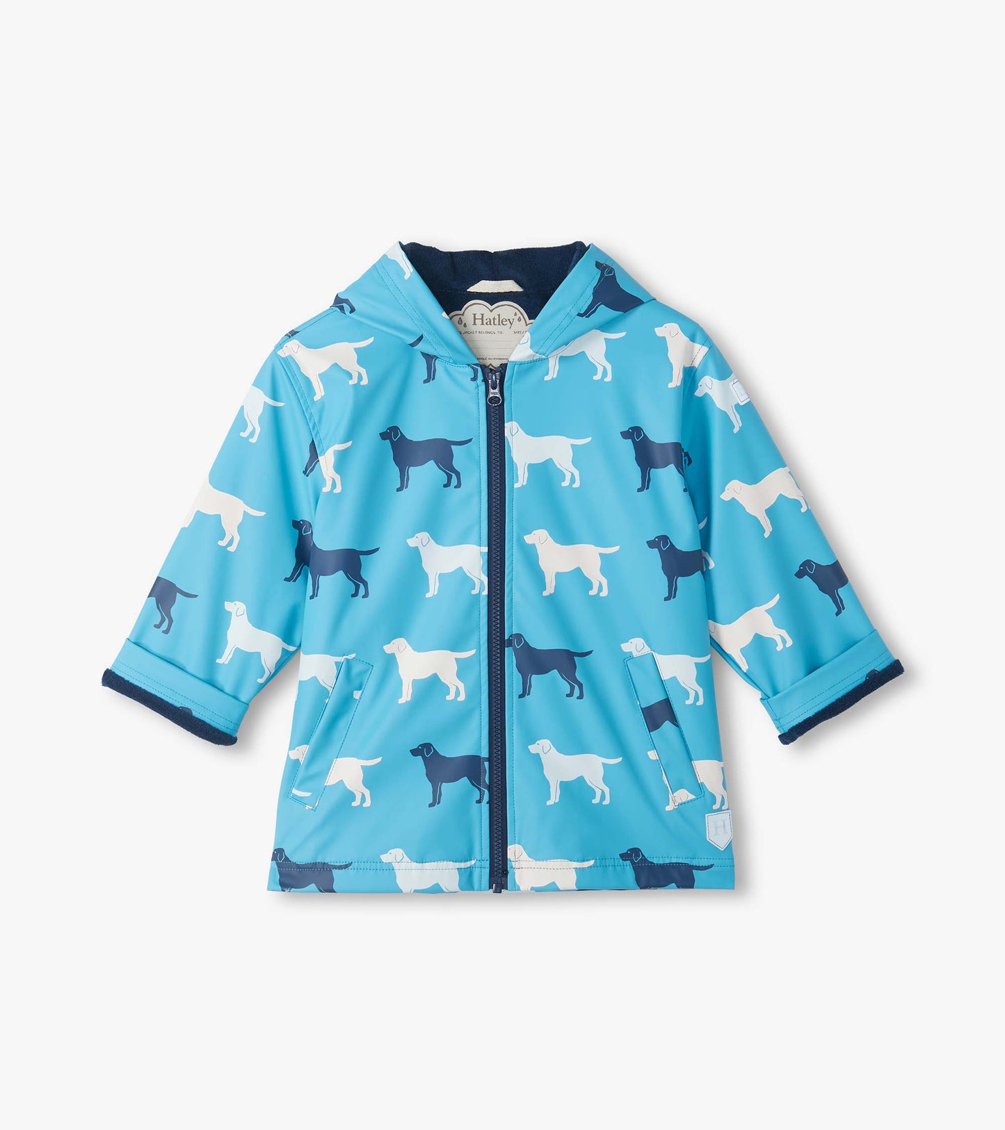Front view of blue hooded rain coat with white and navy dog print, zip front, and angled flap pockets