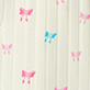 View Girls Tiny Bows Relaxed Fit Pyjama Set Cream swatch with small pink and blue bow motifs