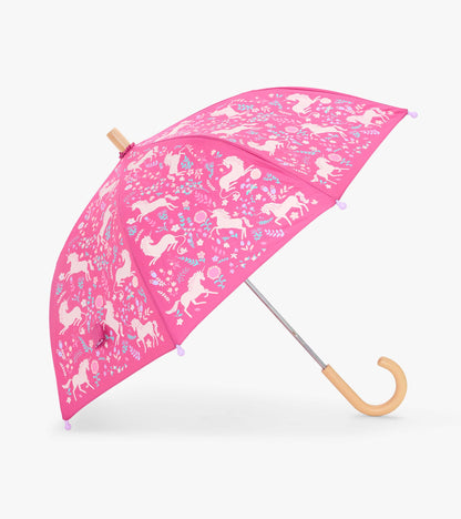 Open pink kids umbrella with unicorn and floral print and a curved light wood-look handle