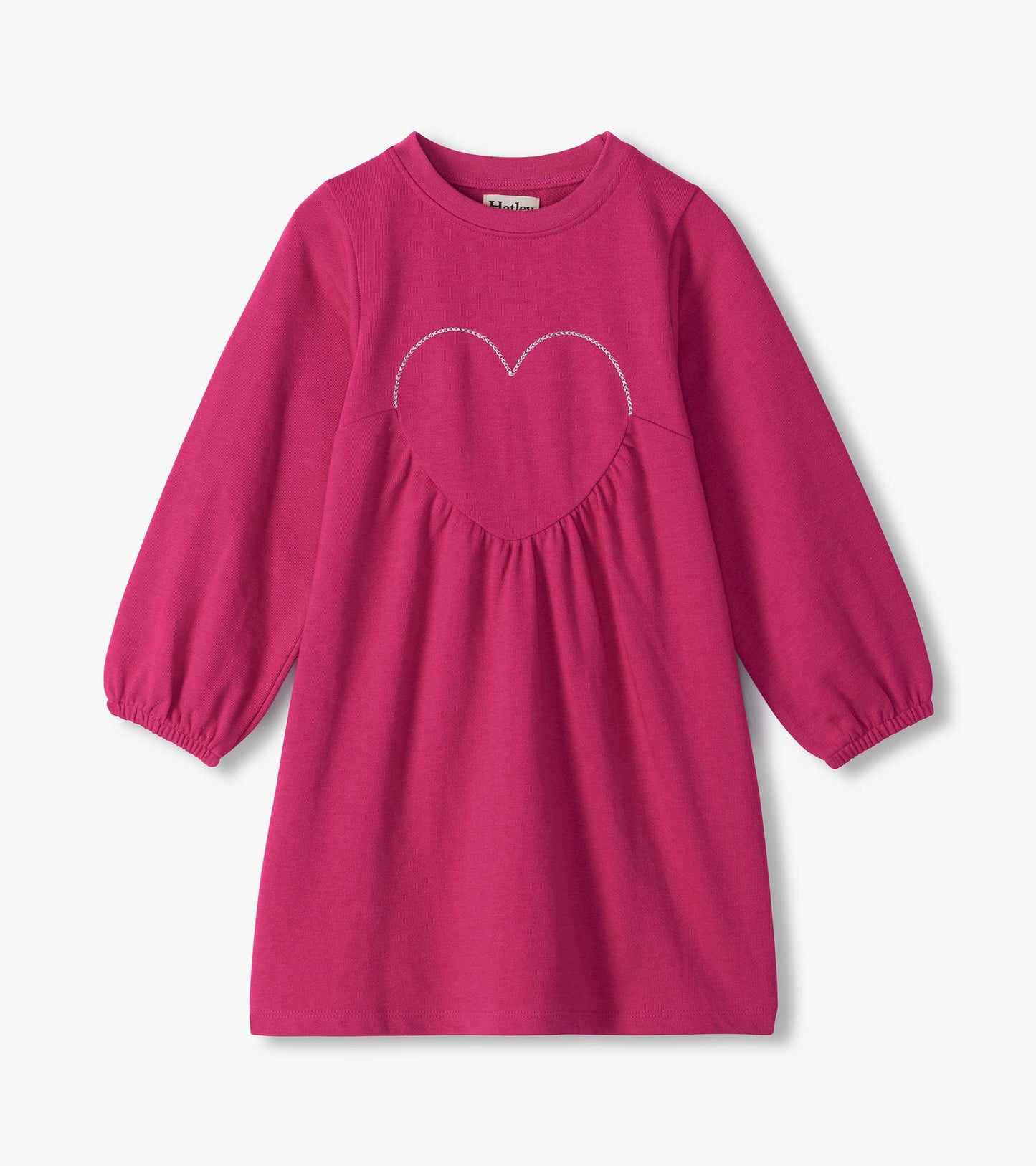 Bright pink long sleeve girls dress with a heart applique on the chest and gathered front detail