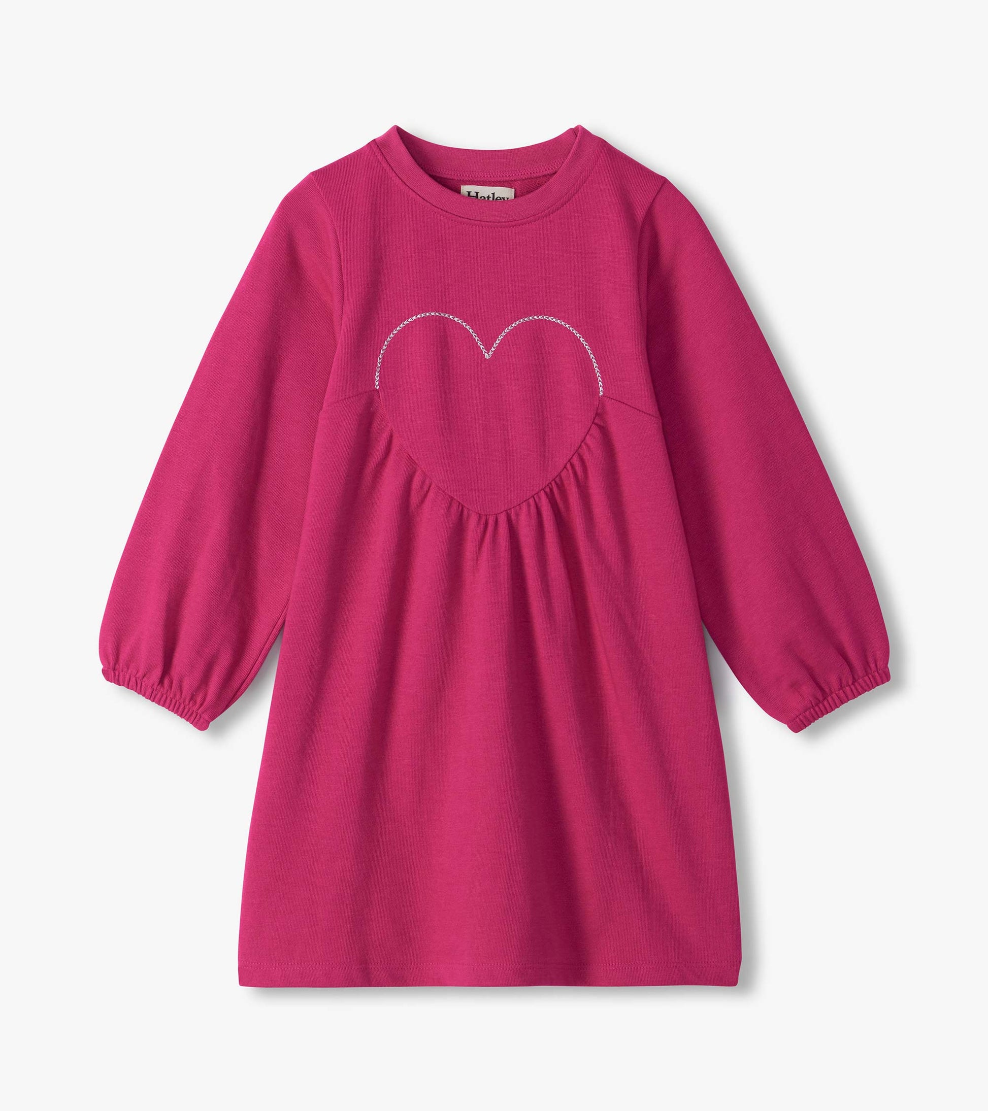 Bright pink long sleeve girls dress with a heart applique on the chest and gathered front detail