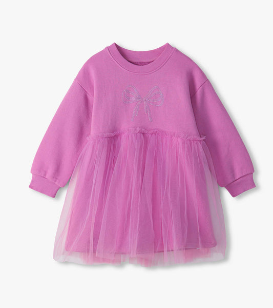 Violet long-sleeve infant dress with a tulle skirt overlay and bow detail on the chest