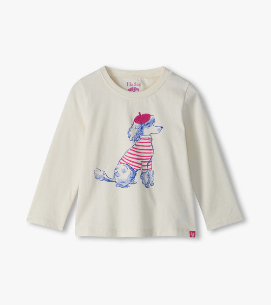 Infant cream long sleeve tee with poodle graphic in a pink striped shirt and beret on the front