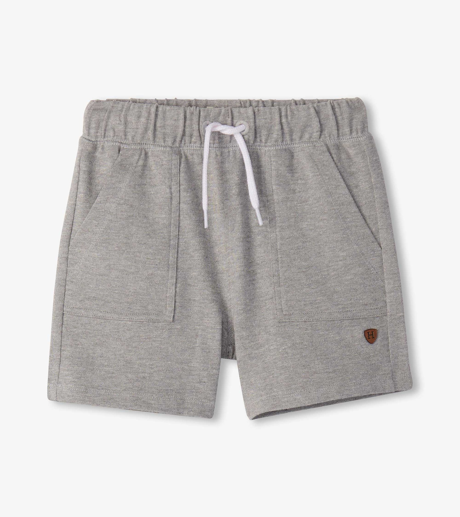 Grey boys athletic shorts with elastic waistband, white drawstring, and front pockets, front view