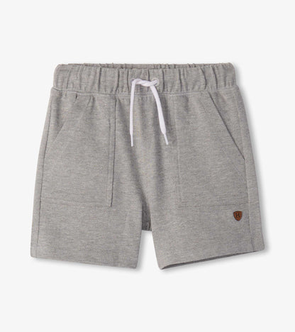 Grey boys athletic shorts with elastic waistband, white drawstring, and front pockets, front view