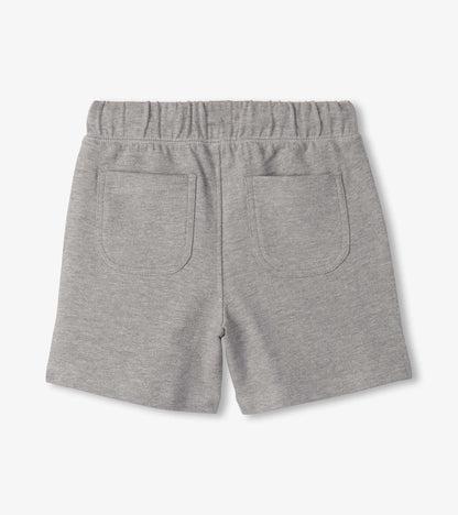 Grey boys athletic shorts with elastic waistband and back patch pockets, back view