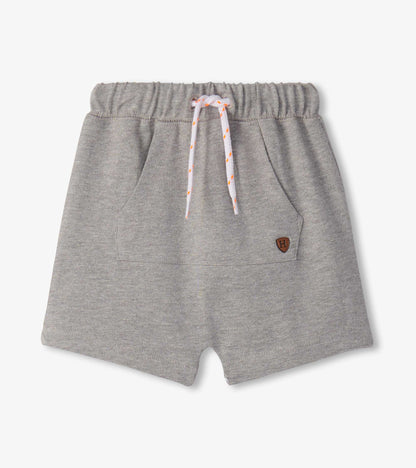 Grey knit toddler shorts with elastic waistband, drawstring, and front kangaroo pocket, front view
