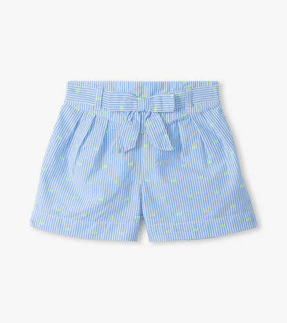 Girls blue striped paper bag shorts with neon dot print and tied waist belt, front view