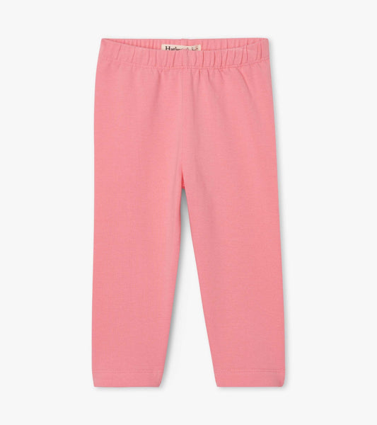 Pink leggings for baby and toddler girls with an elastic waistband and a simple, fitted design.