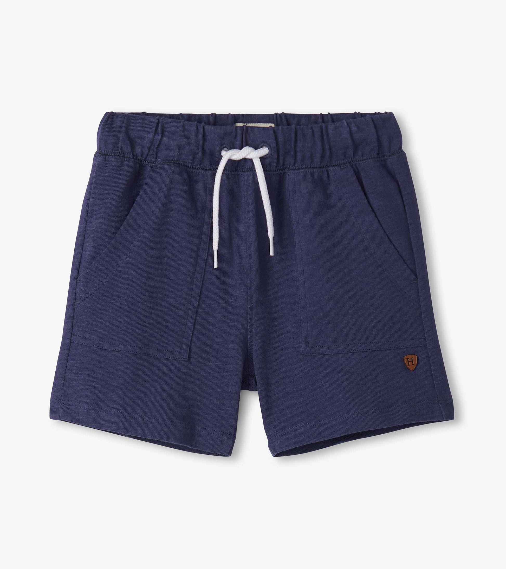 Navy blue boys’ shorts with elastic waistband, white drawstring, and front pockets, front view