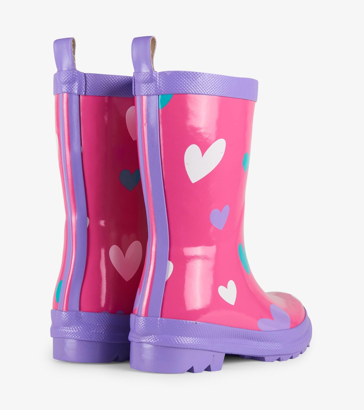 Pink waterproof wellies with colorful heart patterns and purple accents, featuring a textured sole and pull tabs.