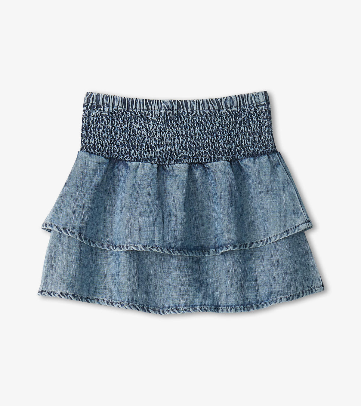 Blue denim girls skirt with smocked waistband and tiered ruffle layers, front view