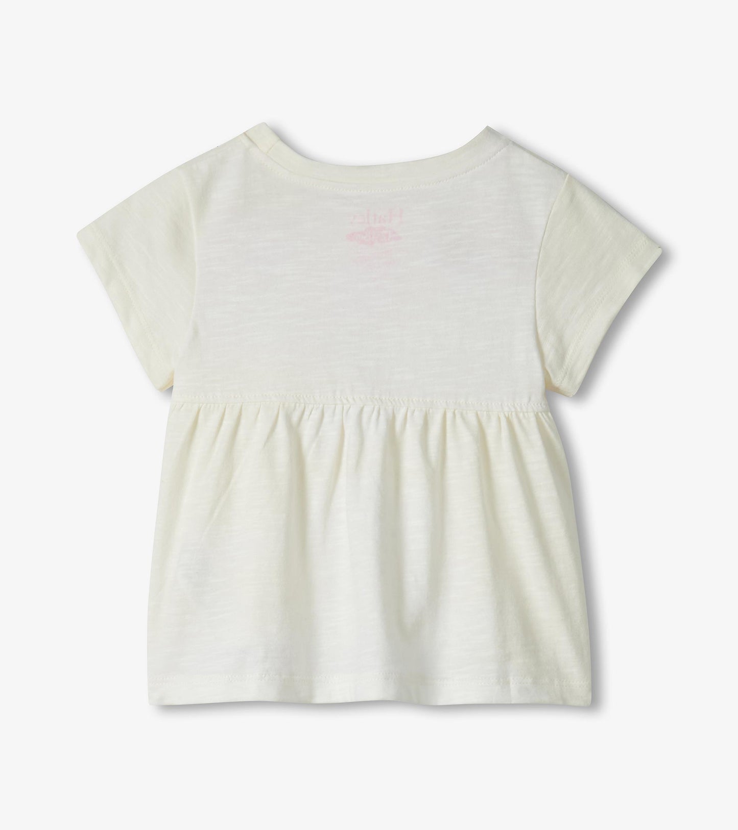Cream short-sleeve toddler dress with gathered waist and faint pink flamingo print on back