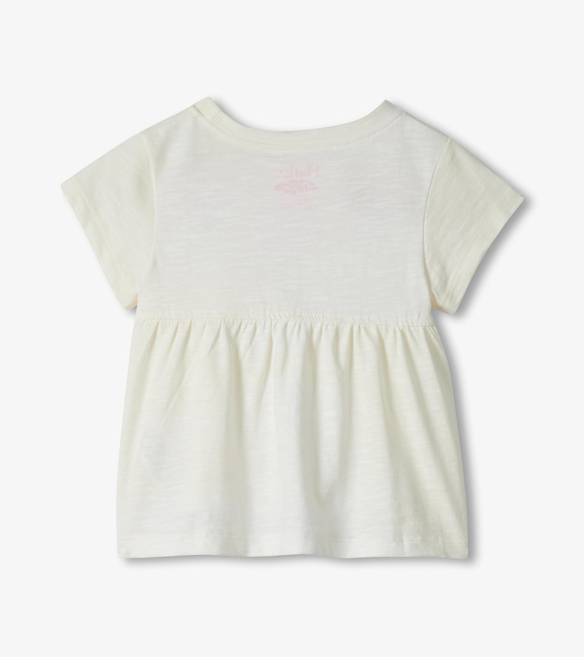 Cream short-sleeve toddler dress with gathered waist and faint pink flamingo print on back