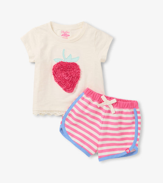 Cream toddler T-shirt with pink strawberry applique and pink-and-white striped shorts with blue trim and bow