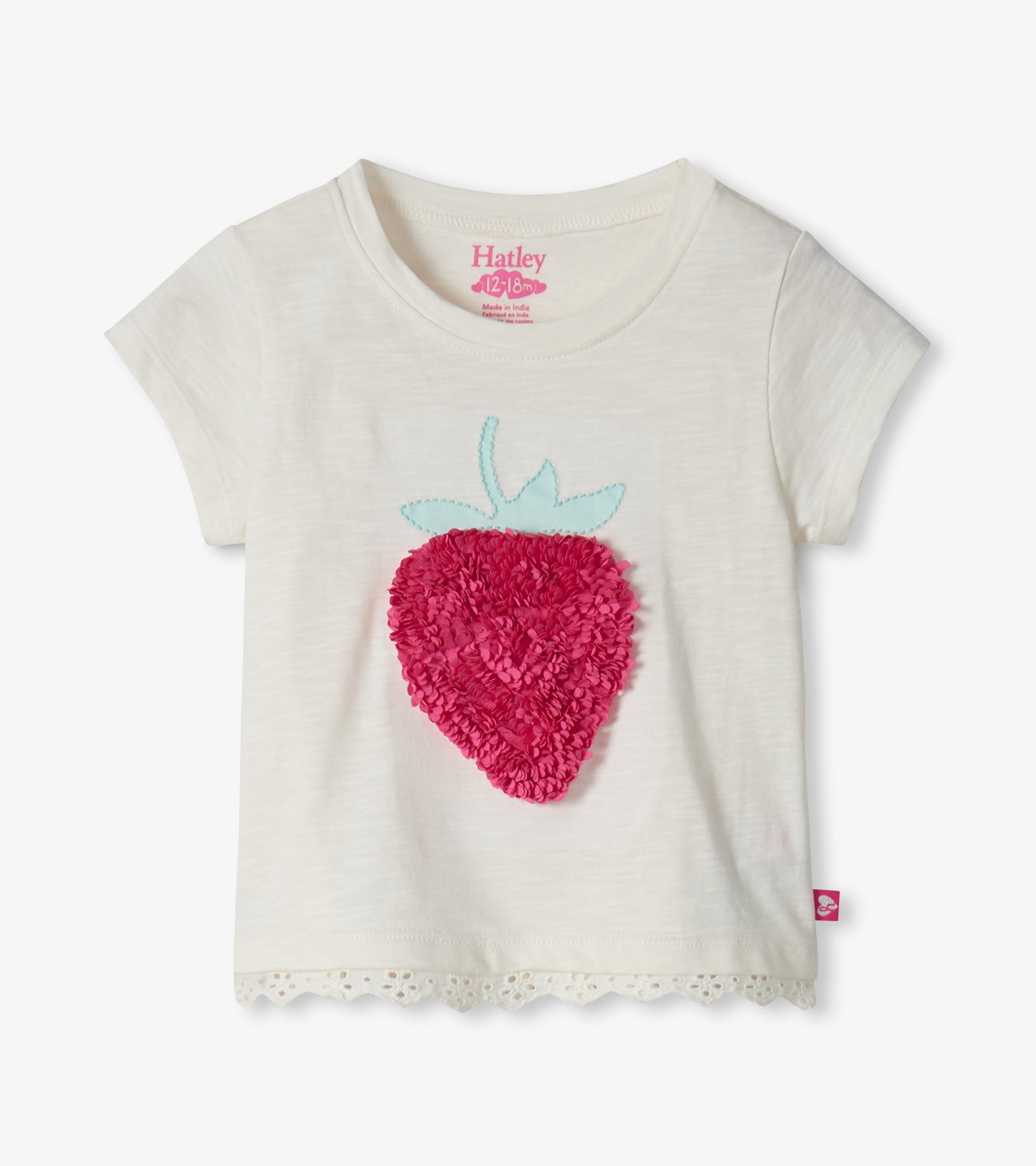 Cream short-sleeve toddler T-shirt with pink strawberry appliqué and lace hem, front view