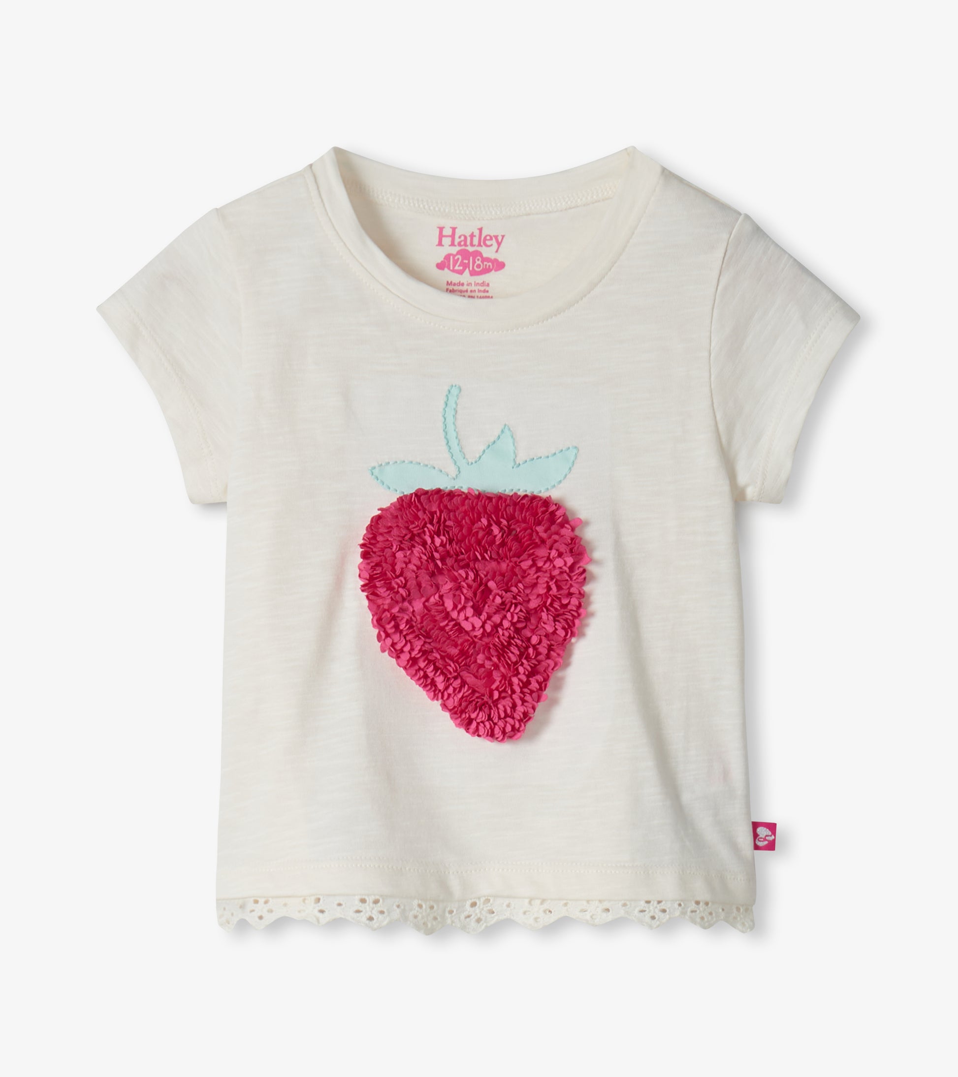 Cream short-sleeve toddler T-shirt with pink strawberry appliqué and lace hem, front view