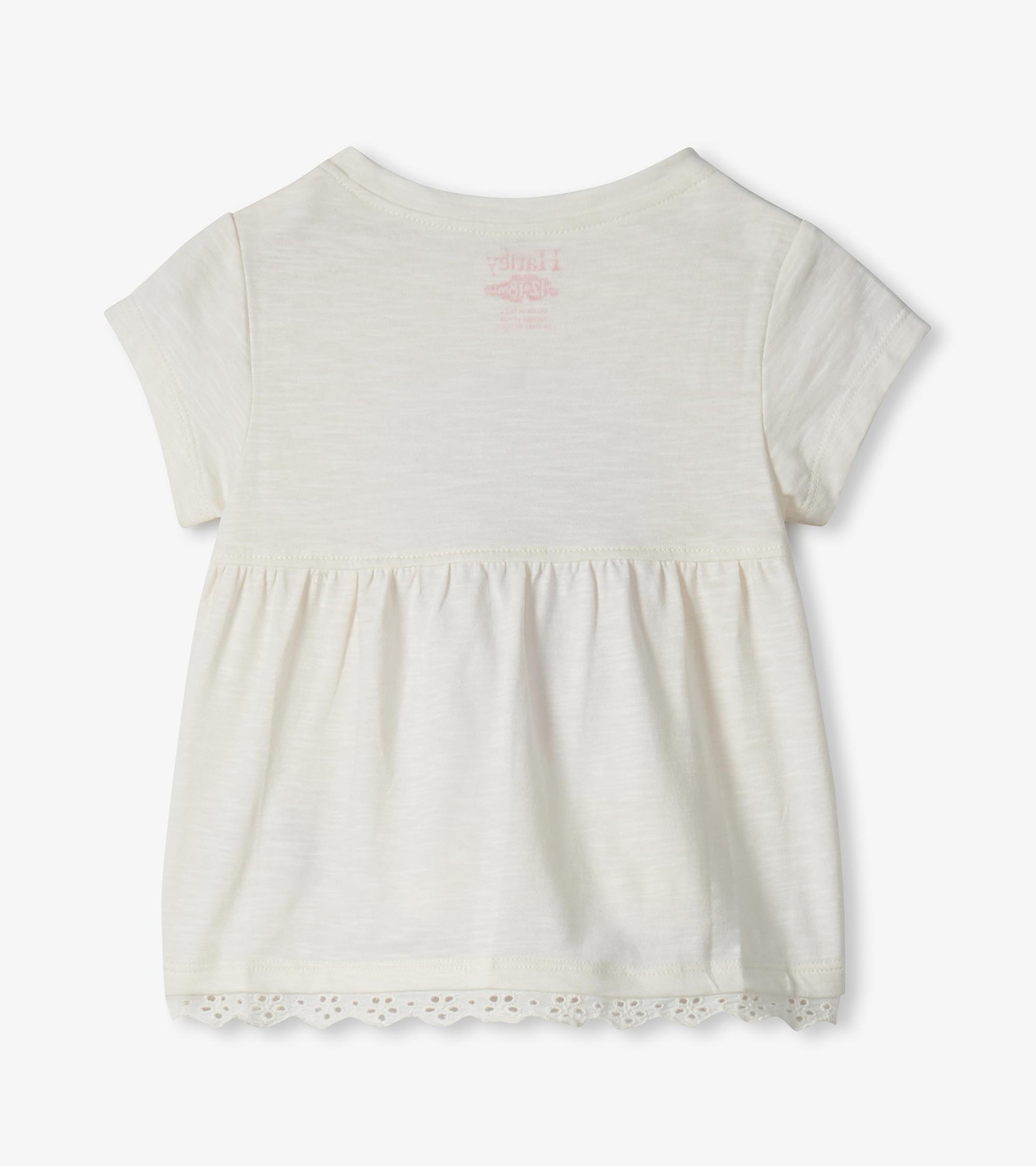 Cream short-sleeve toddler dress with gathered waist and lace hem, back view