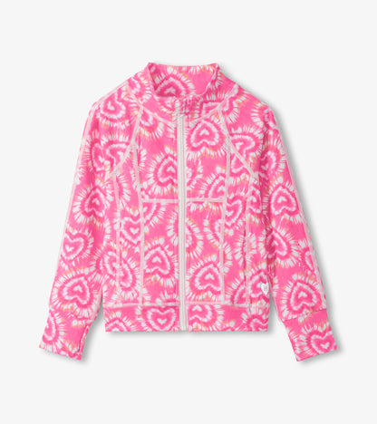 Pink zip-front girls jacket with white heart tie-dye pattern and long sleeves, front view
