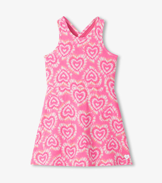 Pink sleeveless A-line dress with heart tie-dye print and scoop neckline, front view