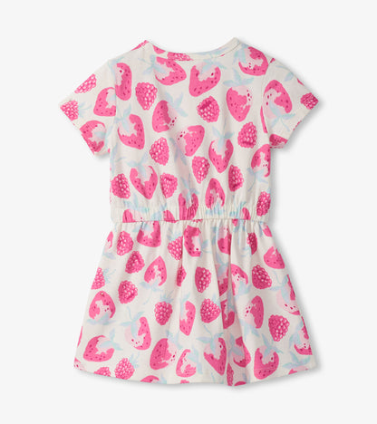 Short-sleeve girls dress with white background and pink berry print, gathered waist, front view