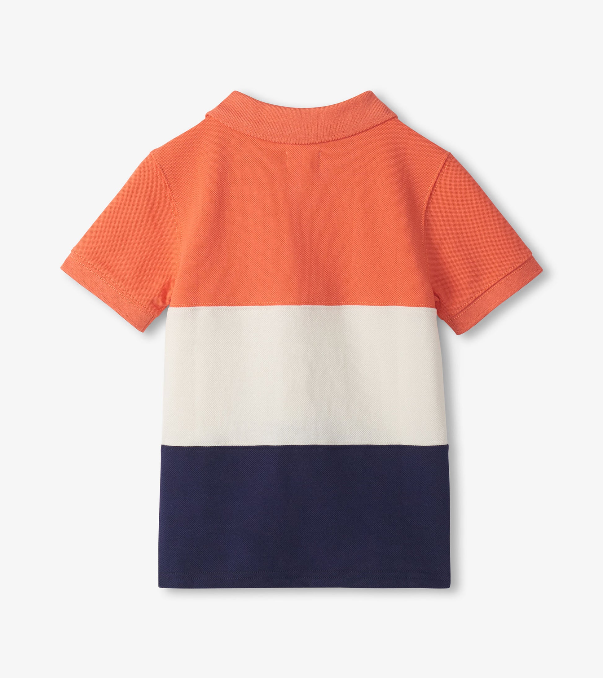 Back view of a boys polo shirt with orange, white, and navy color blocks and short sleeves