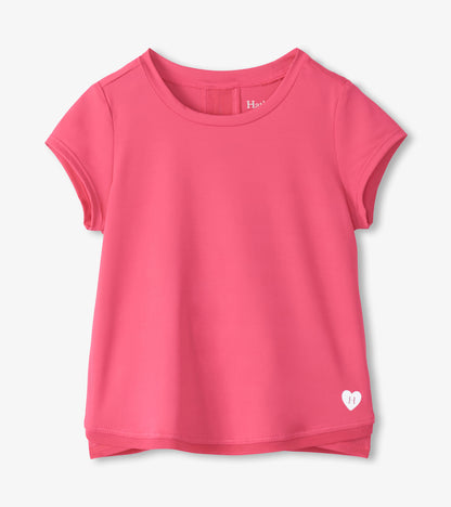 Pink short-sleeve girls T-shirt with mesh trim and a small heart logo at the hem, front view.