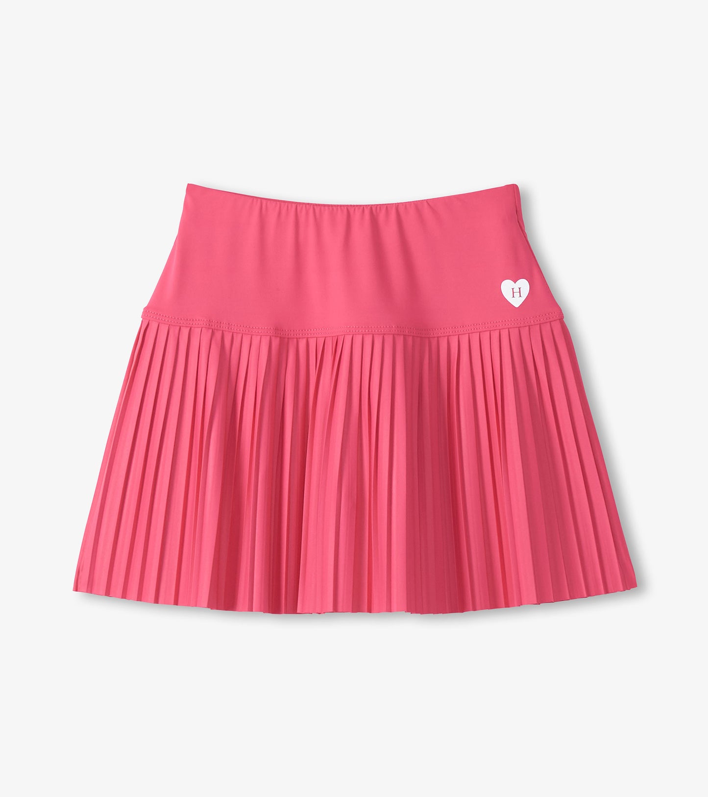 Pink girls sporty skort with pleated skirt and small heart logo on the front