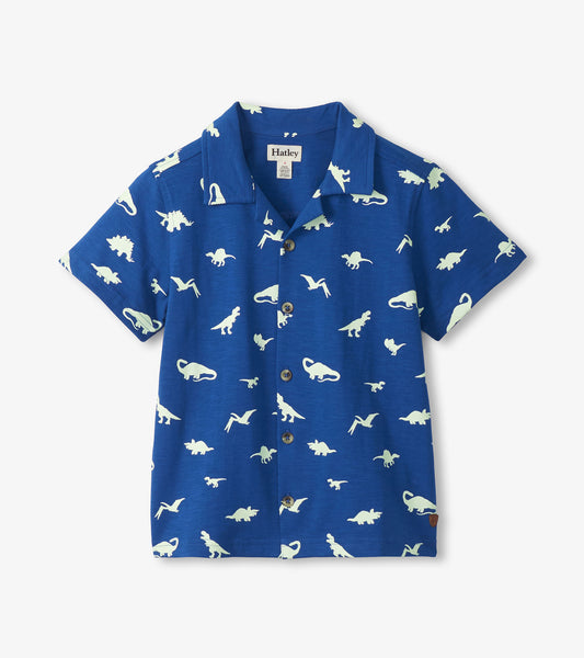 Blue short-sleeve button-down shirt with white dinosaur print, front view