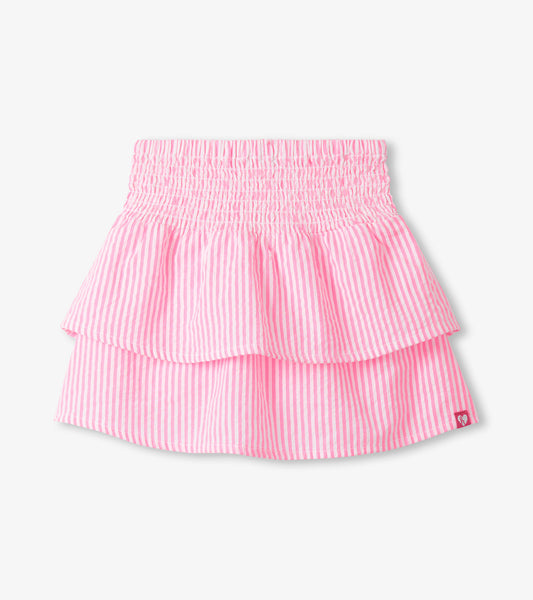 Neon pink and white striped seersucker girls skirt with smocked waistband and layered hem