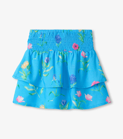 Blue girls skirt with smocked waist and layered floral print hem