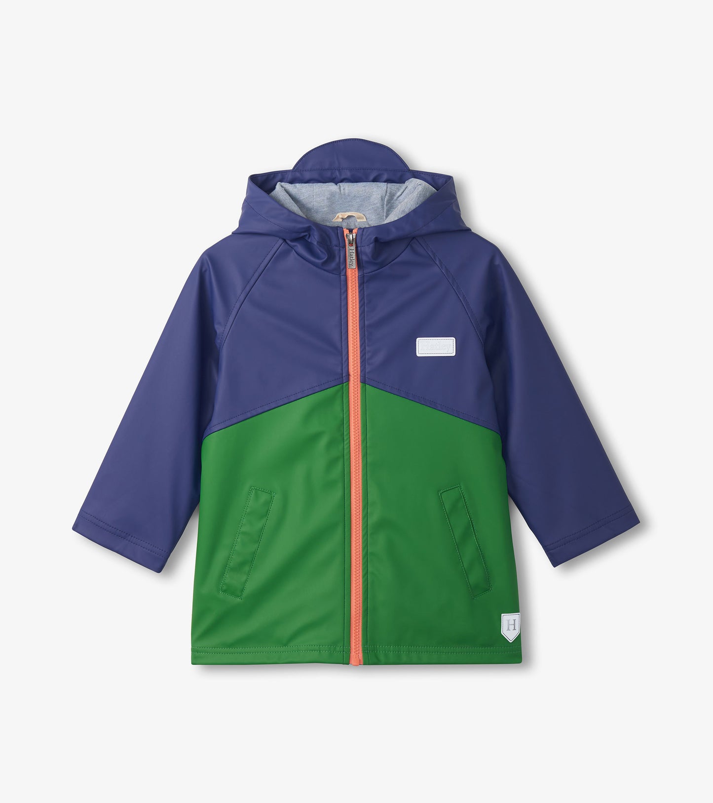 Kids navy and green colorblock raincoat with hood, front zipper, and long sleeves