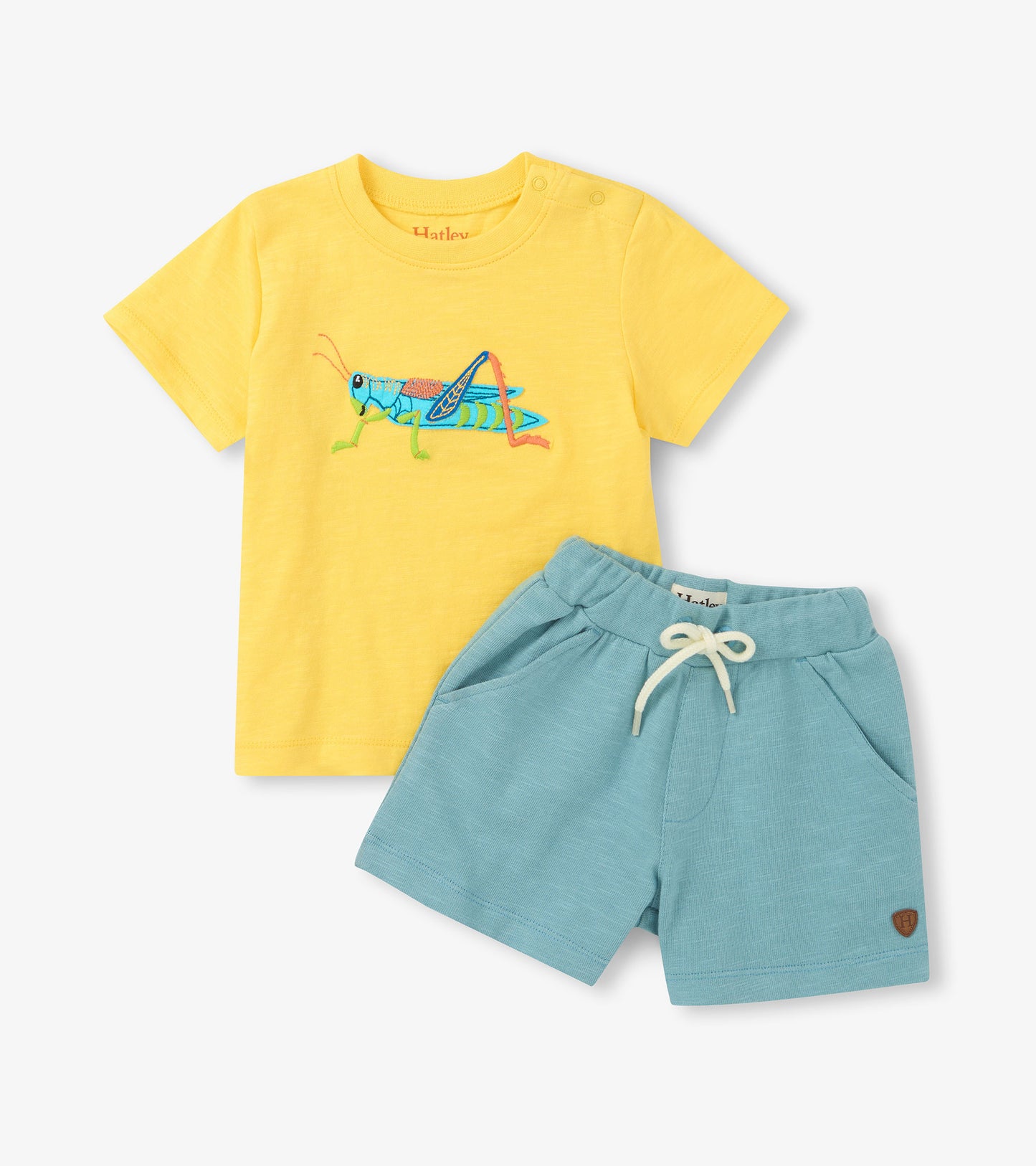 Yellow grasshopper T-shirt with light blue drawstring shorts, shown flat against a white background