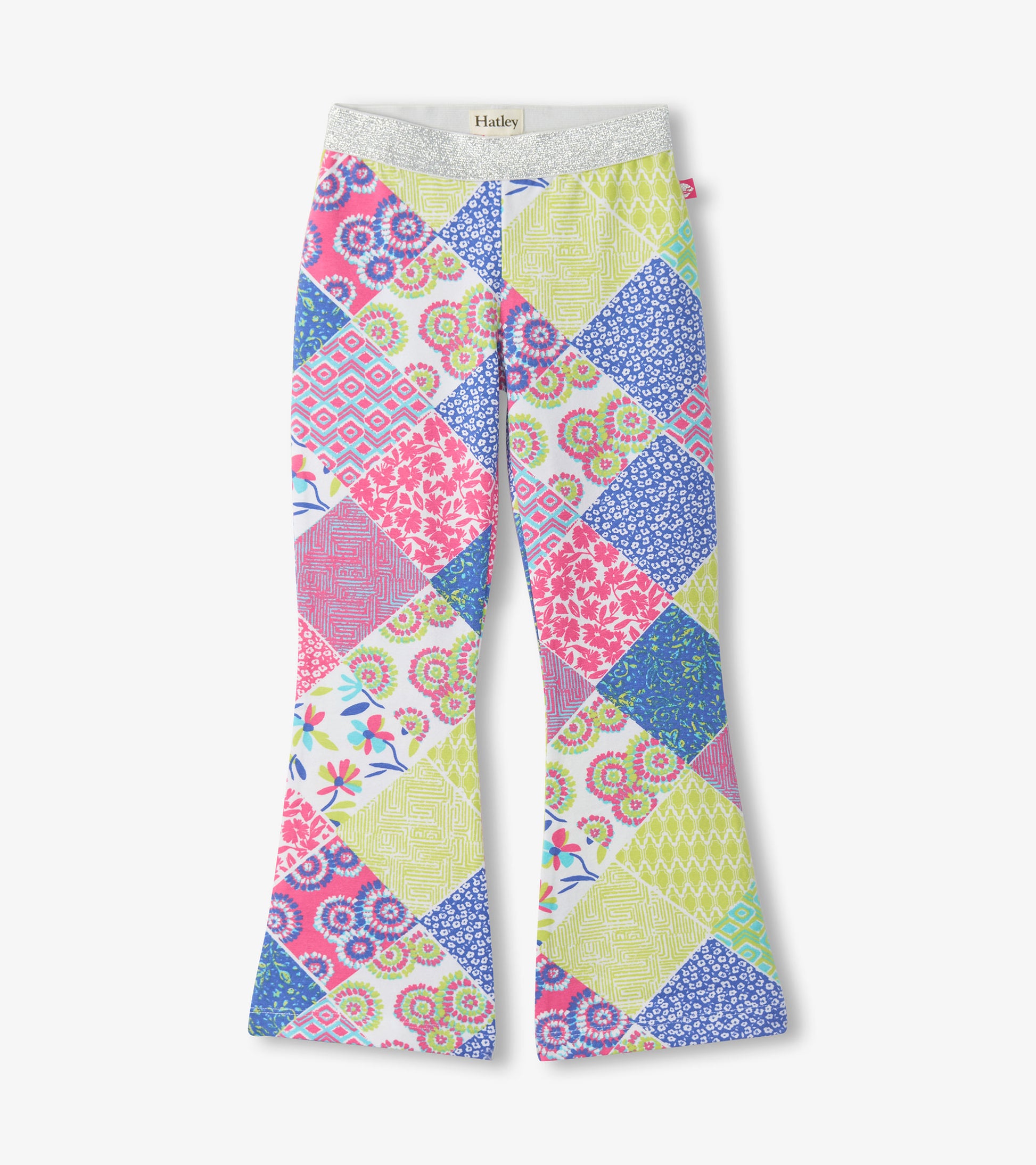 Girls colorful patchwork stretch bell-bottom pants with silver waistband, front view
